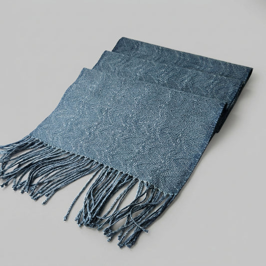 Folded Scarf on a white surface